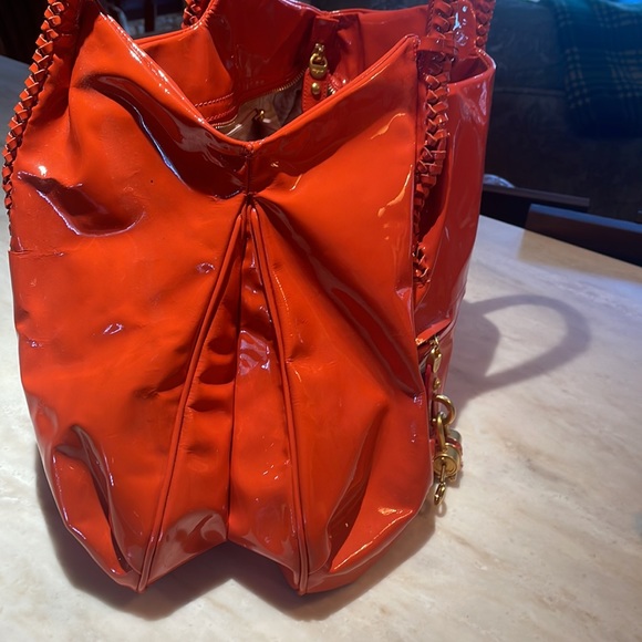 Salvatore Ferragamo orange patent leather satchel. Gently used. - Picture 5 of 12